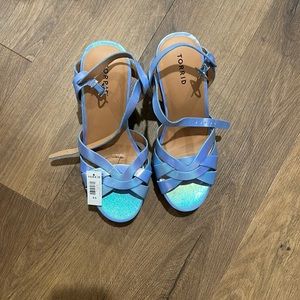 Torrid size 8.5, new with tags, blue metallic sandals heels